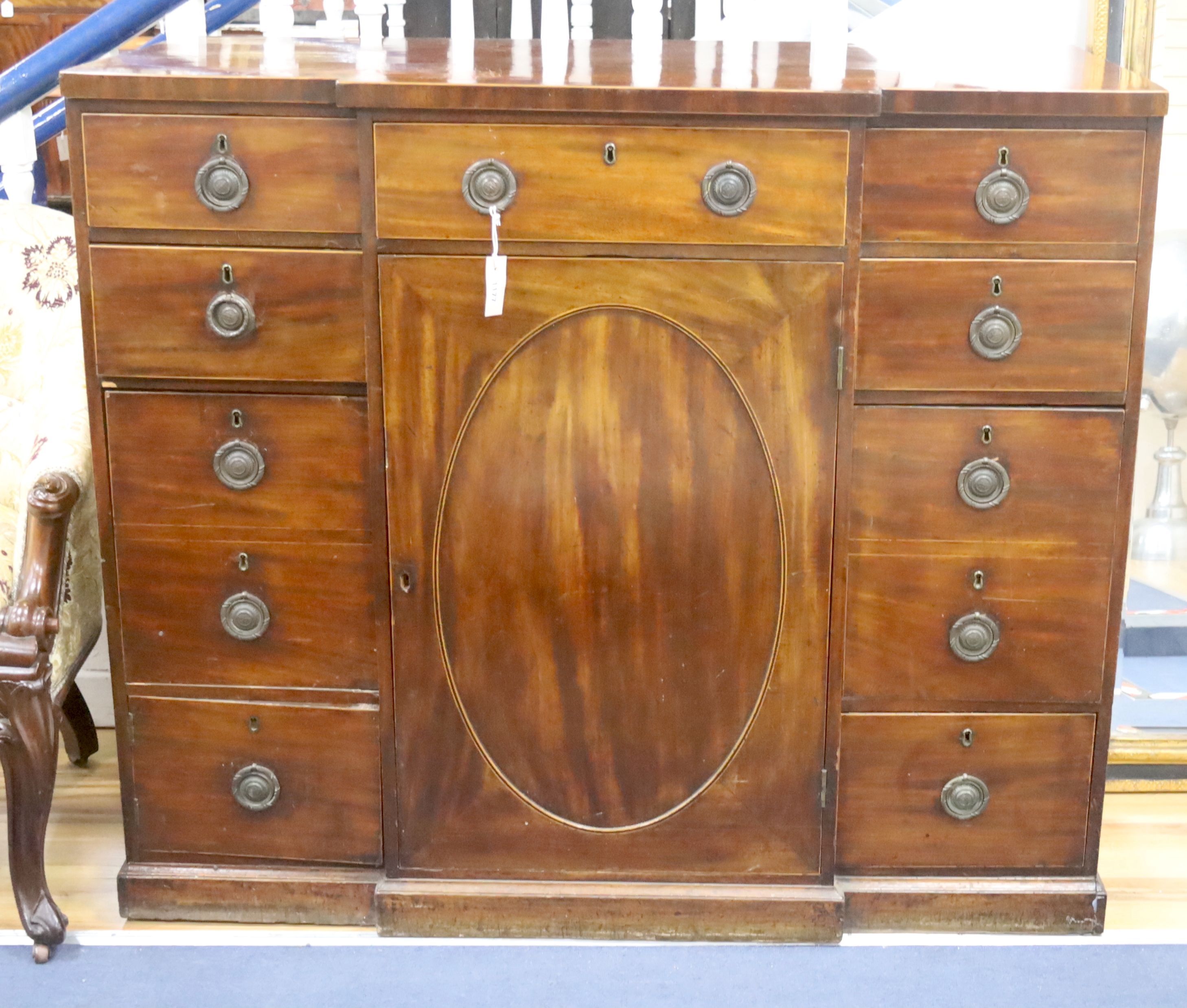 A George III line-inlaid mahogany breakfront side cabinet, H 114cm W 131cm D 62cm (max)